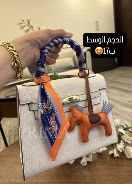 ايرميز كيلي جلد كواليتي عالي مع سكارف وميدالية حصان غير مختومة قاعدة 25 سم