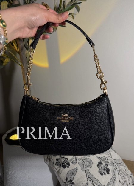 حقيبة تيري من كوتش . حقيبة رائعة متعددة الاستخدامات ذات جودة عالية وتصميم أنيق مختومة فل باكجً مع بوكس ومعها خزانين قصير  للكتف وطويل قاعدة 24 سم