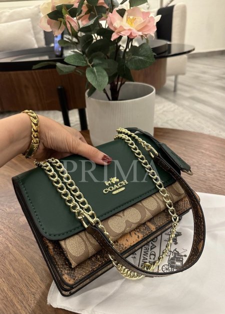 حقيبة كلير كروس بودي من كوتش .تناسق من الجلد السادة وجلد الحية مناسب للاستخدام اليومي مختومة وسعر خيالي قاعدة 21 سم