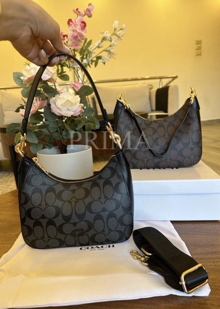 حقيبة كتف "تيري" من ماركة كوتش (Coach Teri Shoulder Bag). تتميز الحقيبة بتصميمها الأنيق جودة عالية مختومة وفل باكج مع بوكس قاعدة 22 سم